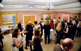 people meeting in semi formal environment for Jersey Society in London